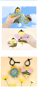 Detail of creative turtle and bee bubble-squeezing keychains with BESTIE text and lanyards