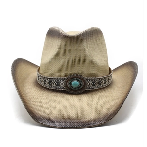 Detail of western straw cowboy hat with vintage embroidery and blue turquoise ornament