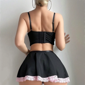 Back view of a sexy pink lace trim pleated mini skirt and black camisole set