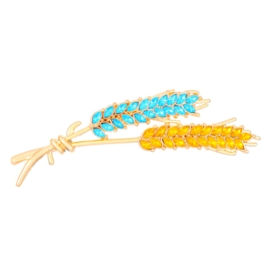 Sparkling wheat ear brooch with blue and yellow rhinestones on gold alloy base