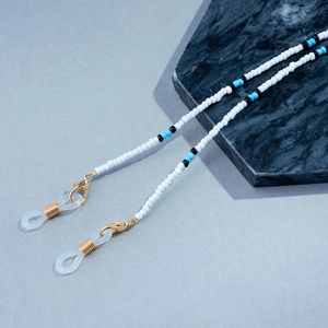 Handmade beaded eyewear chain with blue and black pearls and gold lobster clasps
