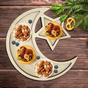Star and moon wooden tray set for Ramadan food serving on a dark wooden table background