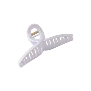 Iridescent flower claw clip in pearlescent light purple for elegant summer updos