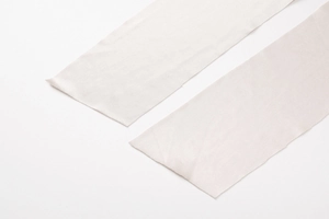 Detailed view of the off-white elastic fabric straps with high-quality textile texture