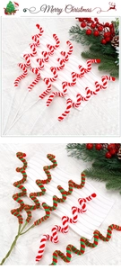 Detail of red and white spiral candy canes on white knit background for Christmas decor