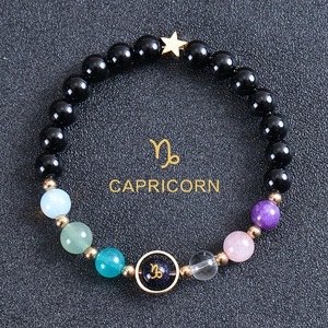 Detailed view of Capricorn bead bracelet with obsidian and colorful natural stones
