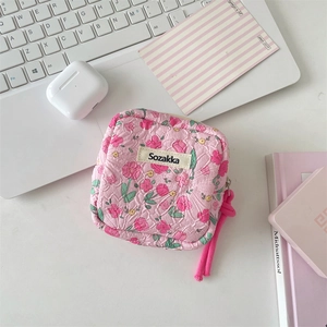 Pink floral quilted cotton storage pouch for earphones with zipper and hand strap