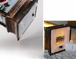 Dettaglio del vano batterie e dell'interruttore per la lanterna di Natale decorativa