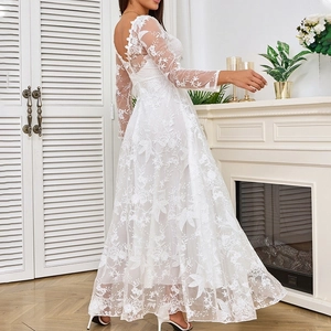 Elegant white lace long-sleeved off-shoulder bridal gown with floral embroidery