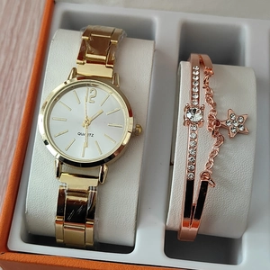 Elegant gold stainless steel watch and rose gold star bracelet set in a gift box