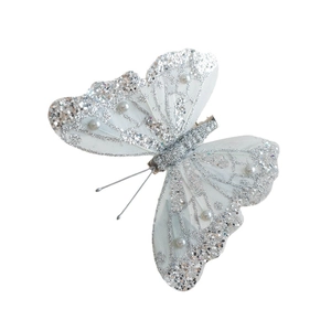 Elegant silver butterfly hair clip with mesh fabric, sequins and pearls on white backdrop