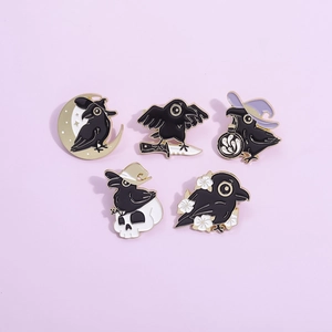 Set of 5 black crow enamel pins with moon, dagger and witch motifs in gold metal plating