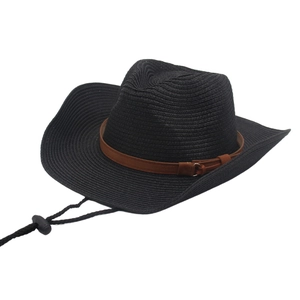Detail of black straw cowboy hat with brown leather band and adjustable windproof strap