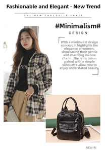 Fashionable black faux leather backpack with multiple zipper pockets shown in lifestyle use