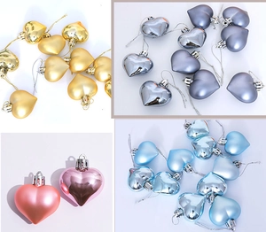 Detail view of 5cm electroplated heart ornaments in matte and glossy finishes for Christmas
