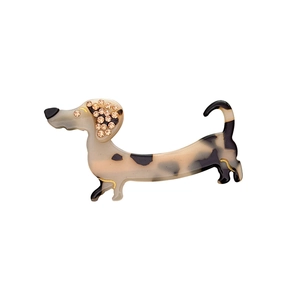 Acetate dachshund hair clip featuring shimmering rhinestones and tortoiseshell texture