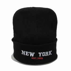 Detailed close-up of high-quality New York embroidery on a black ribbed knit beanie hat