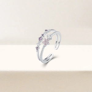 Detail of S925 silver double-layer ring with pink zircon and flower design accents
