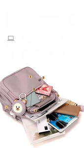 Detailed interior storage showing 7 pockets for tablet, umbrella and accessories