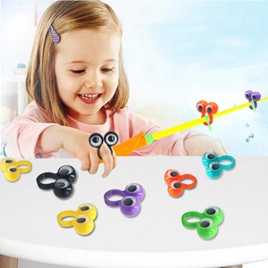 Colorful googly eye rings for kids shown in multiple colors with play scenario