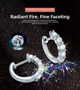 Detailed view of S925 sterling silver stamp on moissanite pavé small hoop earrings
