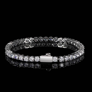 Detailed macro shot of single-row tennis bracelet with silver round-cut cubic zirconia