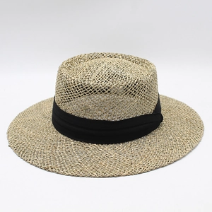 Handwoven straw boater hat for women with flat top and stylish wide black ribbon band