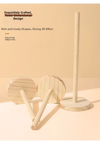 Macro view of solid wood jewelry stand featuring natural grain and polished round base