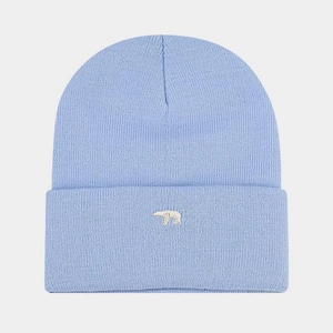 Close-up of light blue ribbed knit beanie with white polar bear embroidery detail