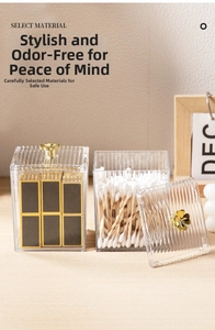 Close-up of clear acrylic organizer set with vertical stripes and gold clover handles