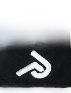 Macro shot of 3D white embroidery on a black distressed baseball cap with P-logo detail
