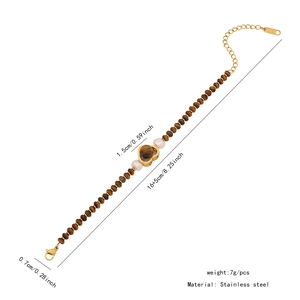 Detail view of tiger stone bead bracelet with stainless steel heart charm and dimensions