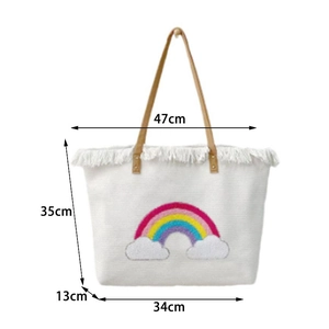 Detailed dimensions of the canvas tote bag with rainbow embroidery and white tassels