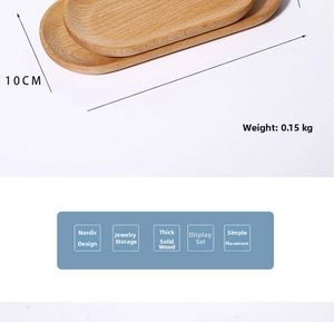 Detailed view of oval solid wood jewelry trays with natural grain and 10cm width dimension