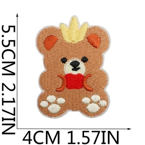 Close-up of bear patch embroidery with crown detail and exact dimensions shown