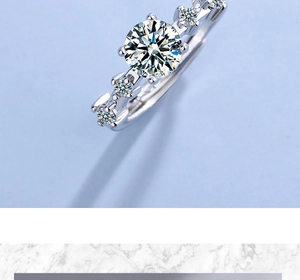 Macro view of six-prong silver ring with brilliant-cut round zircon and stone settings