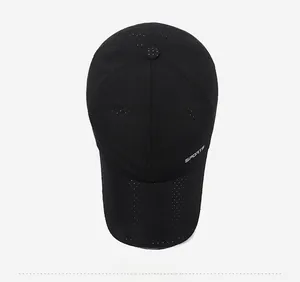 Top view of black mesh baseball cap with breathable laser-cut holes and SPORTS text detail