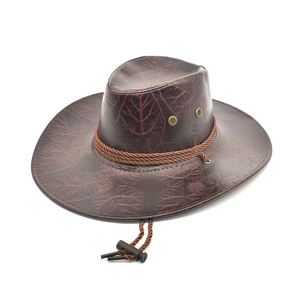 Detail of vintage cowboy hat featuring leaf vein texture and braided rope accent
