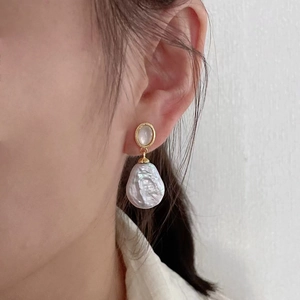 Elegant gold baroque pearl earrings with shell inlay in a vintage aesthetic style