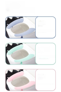 Waterproof silicone toilet seat pads in blue, mint green, and pink colors