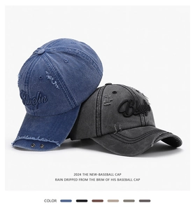 Détail de casquette vintage en coton lavé avec broderie 3D et anneaux métalliques