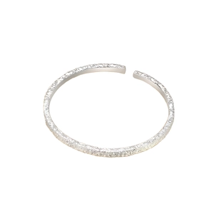 Adjustable silver hammer-textured open bangle with a brilliant crushed ice shimmering finish