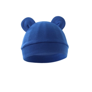 Detail of baby bear ear knit hat in navy blue made of soft cotton material