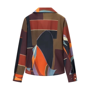 Back view of a retro geometric print long sleeve satin shirt in orange and blue colors