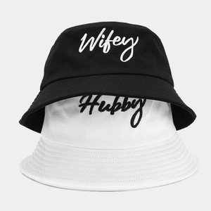 Black and white couple bucket hats with Hubby and Wifey embroidery in premium cotton