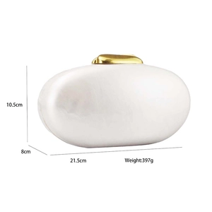 Elegant white acrylic shell clutch bag for wedding or dinner party with gold clasp