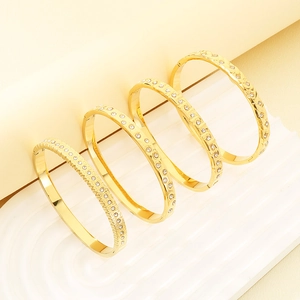 Luxury 18K gold plated titanium steel bracelet set with shimmering zircon stones