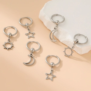 Minimalist stainless steel sun moon and star dangle earrings set in silver finish