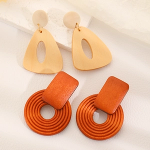 Minimalist geometric wooden earrings in hollow triangle and tiered circular designs