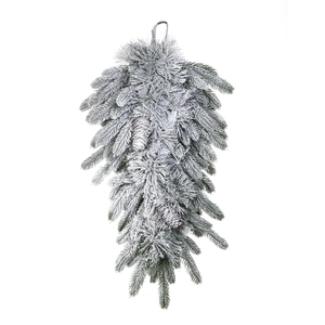 Detail of flocked Christmas swag with faux pine branches and pinecones for winter decor